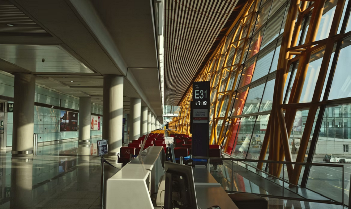Airport terminal gate area with boarding station
